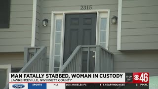 Man fatally stabbed, woman in custody