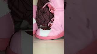 Various Shoes Walk By And Step On Tiny