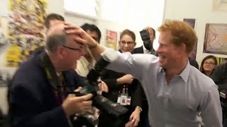 Prince Harry pulls paint prank on press photographer in New Zealand