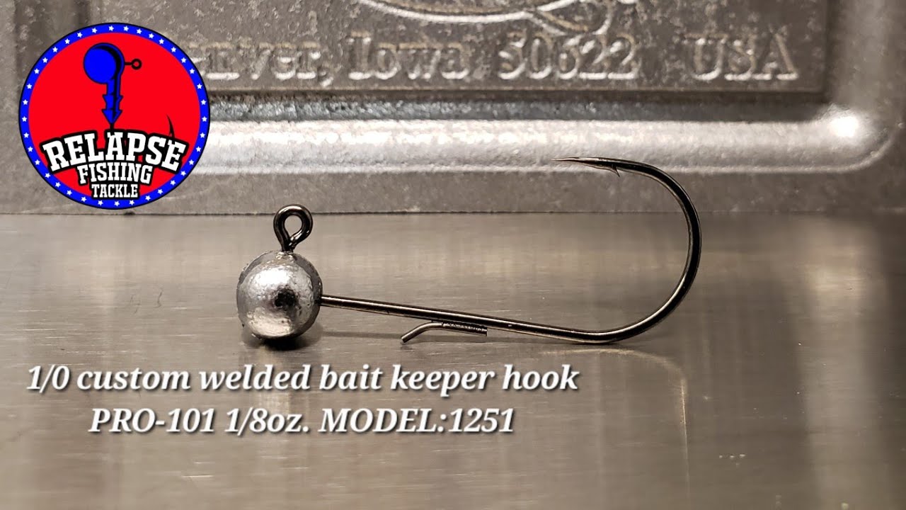 Pouring up some custom round-head jigs with bait keeper hooks in a