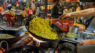 Chinese Street Food - Fried noodles with egg fried rice, fried broiler, egg and vegetable pie