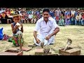 Playing of snake or sap khela,,