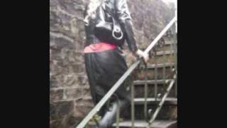 Leather and full make-up in the garden