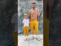 Brazilian model Chico Lachowski poses with his son