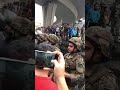 جندي لبناني يبكي متأثرا بغناء المتظاهرين في جل الديب