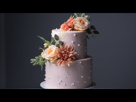 Wedding Worthy Pearl and Floral cake  @Rosiesdessertspot