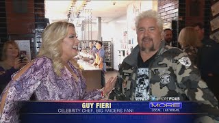 Celebrity chef guy fieri celebrates his birthday at las vegas
restaurant with a silver and black theme.