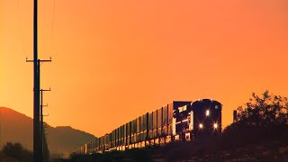 BNSF Intermodal Double Stack Train Rolls Off Into The Sunset, Hector CA