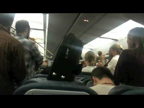 Music band plays on delayed flight