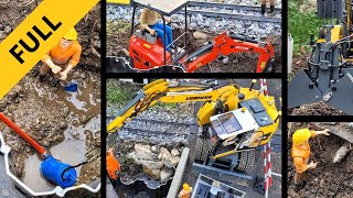 Drilling under the railway with missile mole. RC excavator Liebherr A918, Kubota U17. FULL Edit