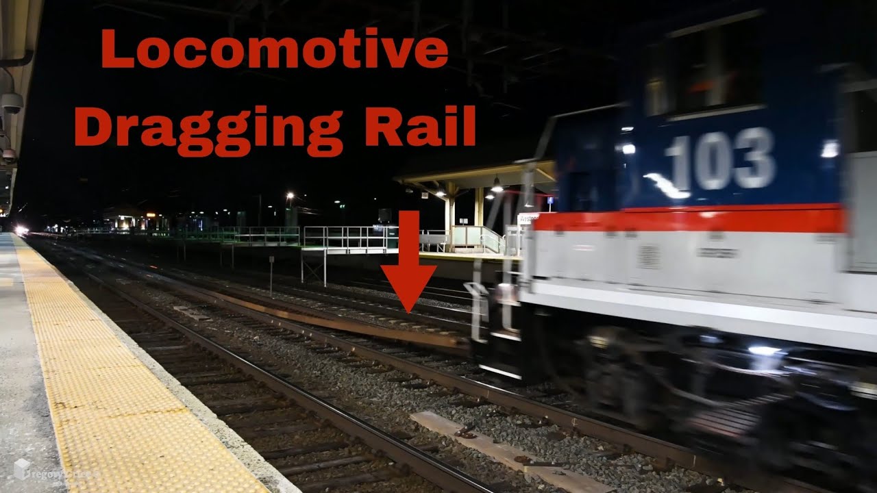 MNR GP35r 103 Drags Continuous Welded Rail at Westport