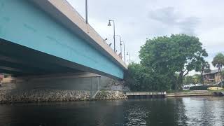 Guy swings on rope swing and crashes into bridge
