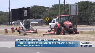 TXDOT crews working to clear debris and weeds after experiencing delays