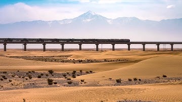 GLOBALink | China opens last section of rail loop around its largest desert