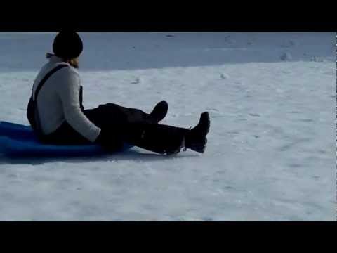 Sledding on Old Main Hill at Utah State, January,  by B.W. Rigby