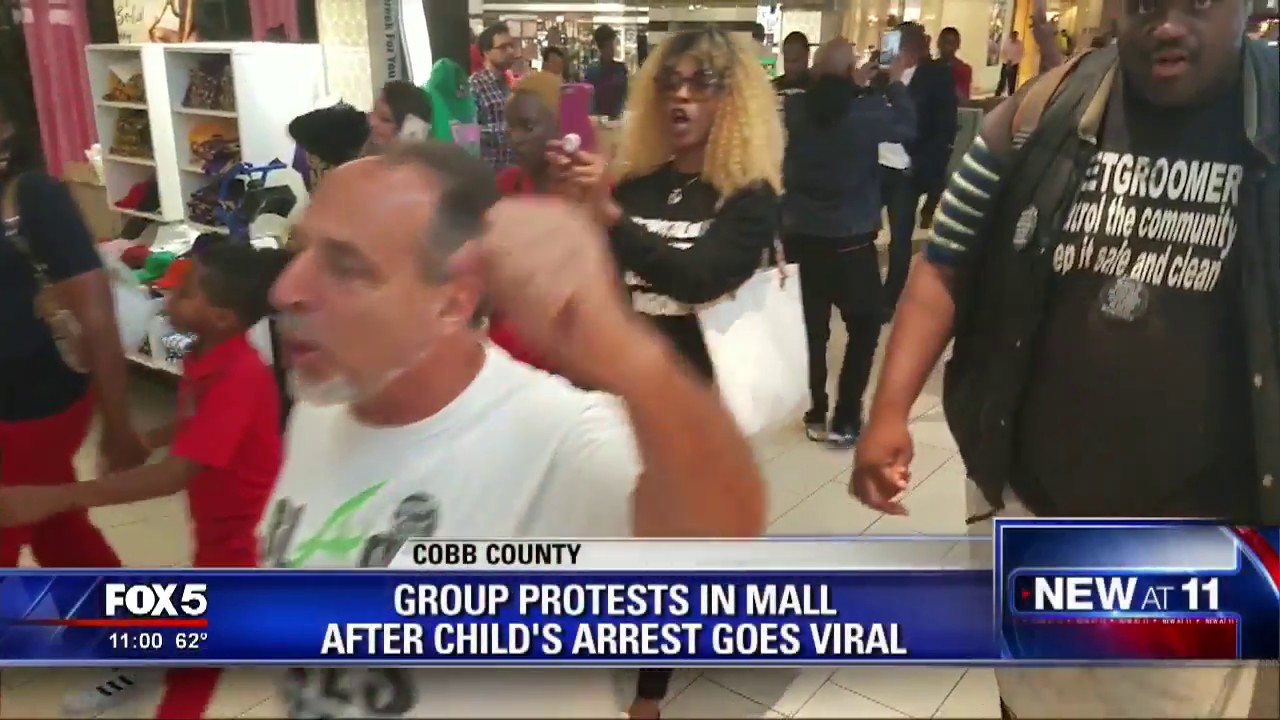 Group protests in mall after child's arrest goes viral - YouTube