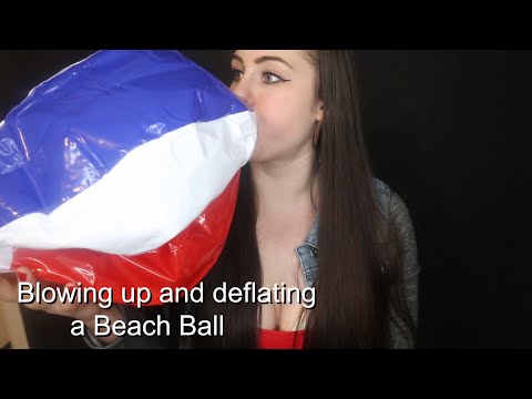 Blowing up a beach ball,