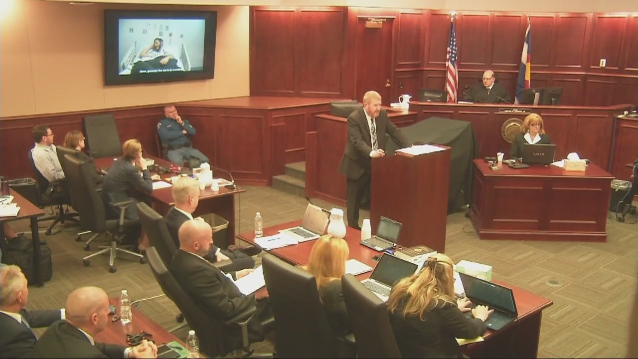 James Holmes on hospital bed from Theater Shooting Trial opening statements