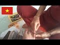 Mama's mom talking chatty with a clerk at a nail salon in Vietnam