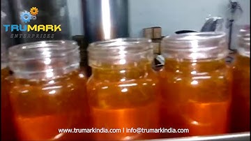 Automatic honey filling , capping and labeling machine