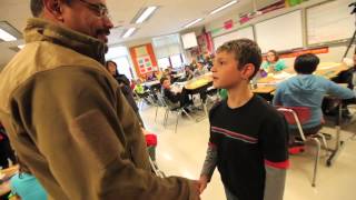 Veteran surprises his son at school