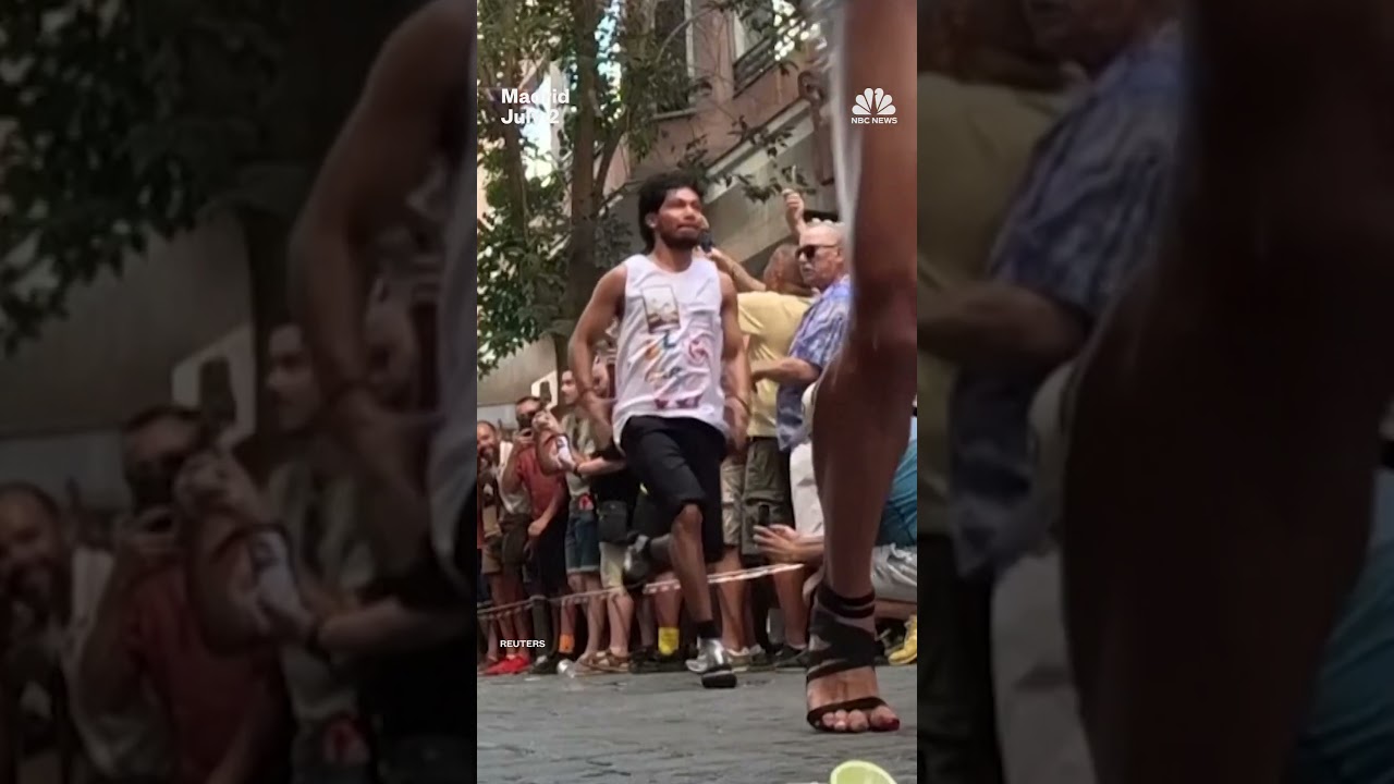 Runners compete in a 100-meter race in 5.9 inch high heels during Madrid Pride