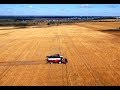 Harvesting wheat Acros 550  drone footage russia