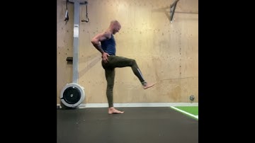 Band standing short range hamstring curls