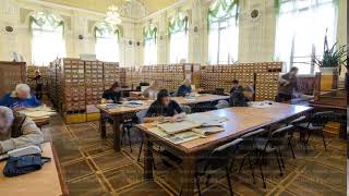 People studying in the reading room of national library timelapse