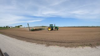 Disking ground and planting corn.