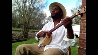 Cedric Watson on gourd banjo 