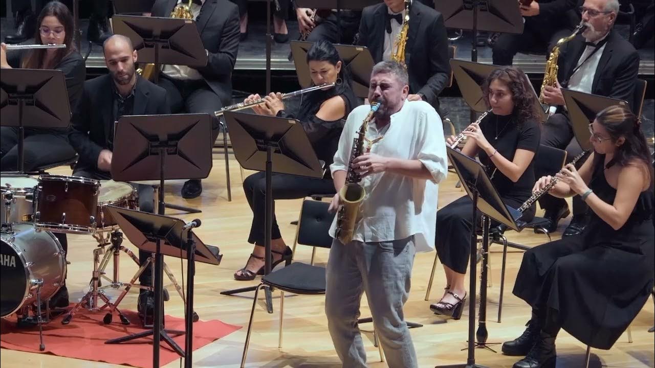 THE MUSIC OF THE FUTURE (for Jazz Quartet & Wind Ensemble) Composer