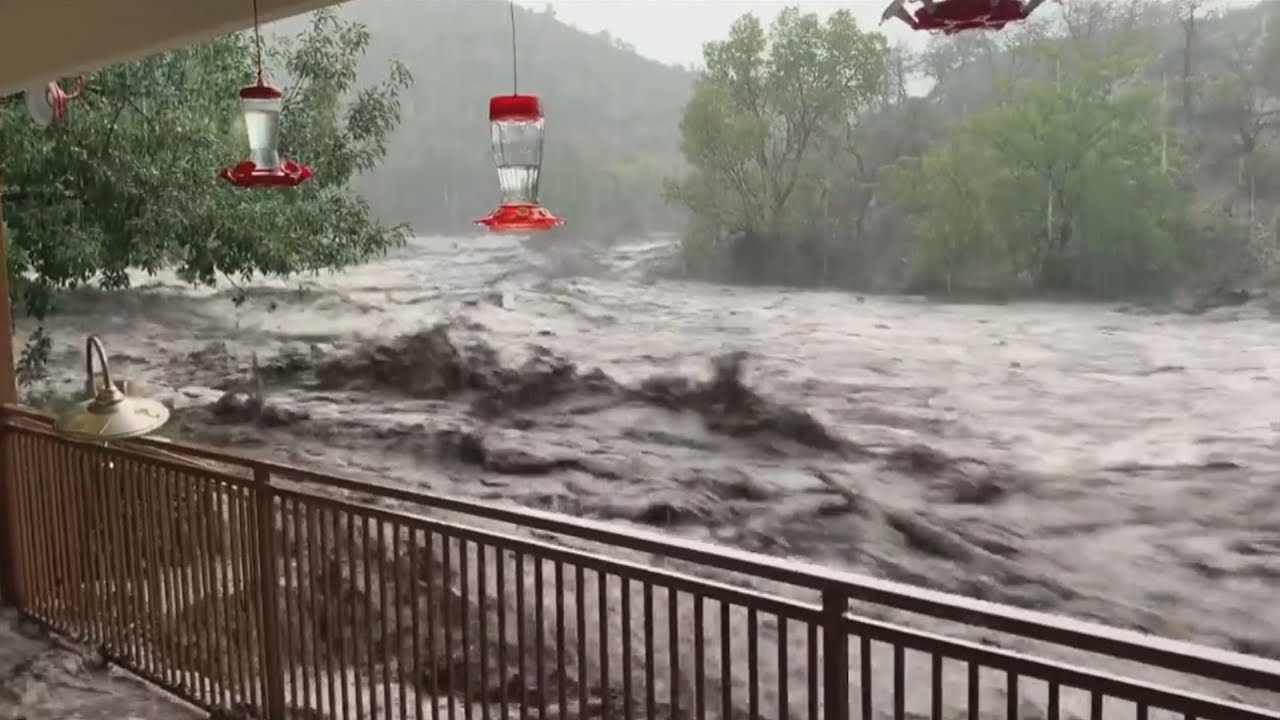 Terrifying video shows floodwaters surround Gila County home - YouTube