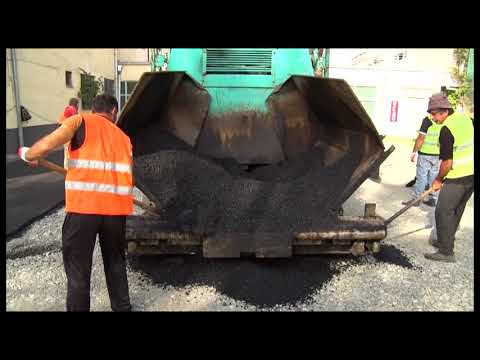 ქუთაისში ტანვარჯიშის სკოლასთან მისასვლელ გზაზე ასფალტის საფარი იგება