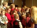 Hattie singing Silent Night in church