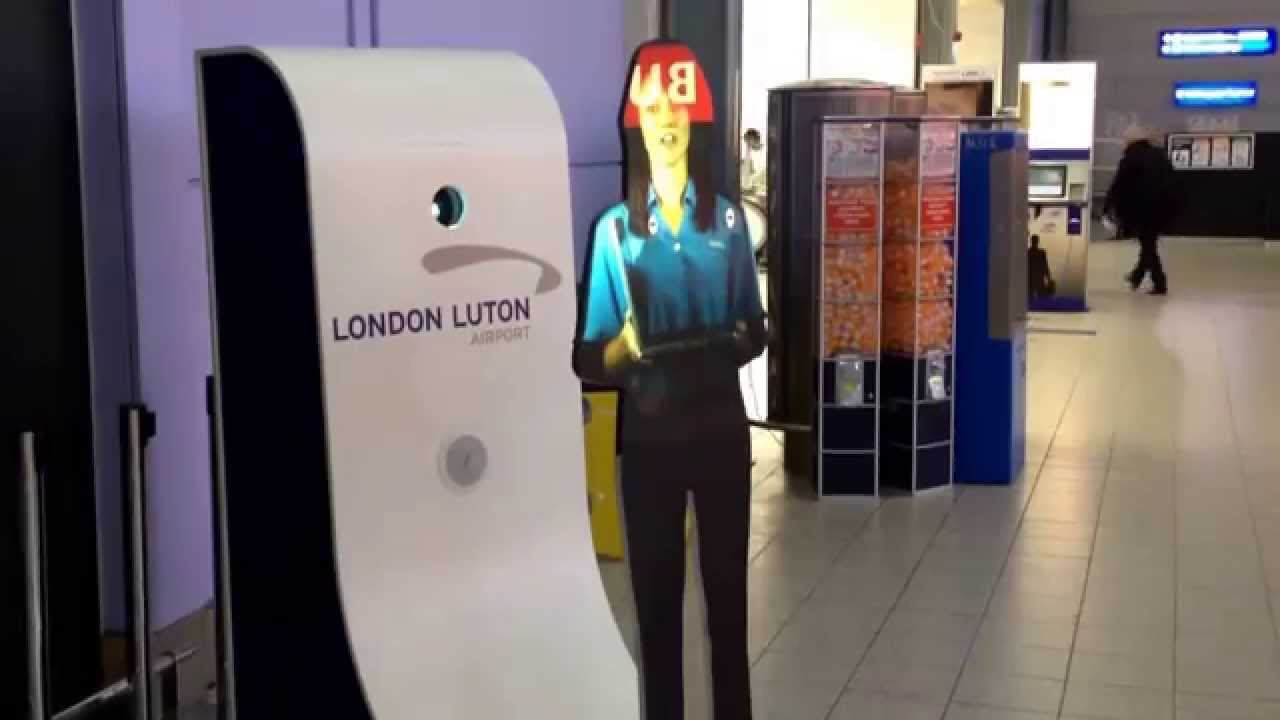 Hologram security information woman at Luton airport YouTube