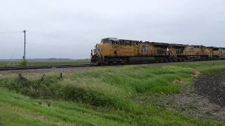 UP 7497 a C45ACCTE leads a manifest west through Maple Park IL