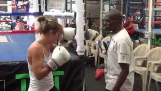 Roger Mayweather padwork with UFC fighter Heather Jo Clark