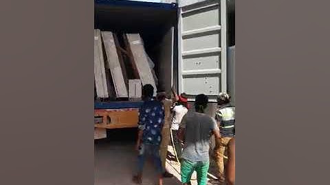 How to unload granite slabs from a container without forklift