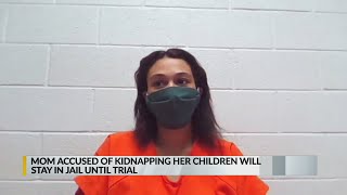 Mom accused of kidnapping 2 sons will stay behind bars until trial