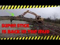 Pond dredging with the 120 and the super stick awesome video  #superstick