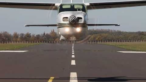 Cessna 210M Centurion low pass