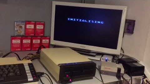 Atari 600xl connected with Atari 1050 disk drive using 3d printed SIO connector