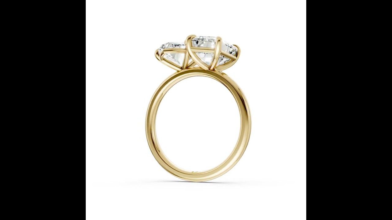 Emerald And Marquise Cut Diamond Two-Stone Ring