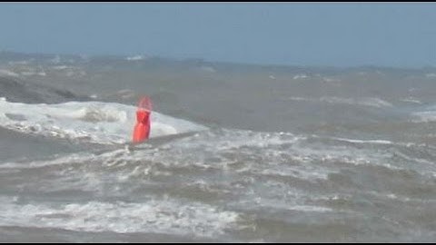 A bobbing buoy caused by waves