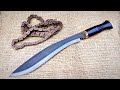 Making wootz steel out of a car chain making a nepalese kukri knife