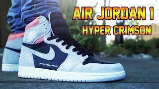 jordan 1 neutral grey hyper crimson on feet