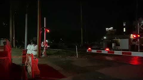 LIRR MP15AC 166 Leads Rail Train Through Mineola