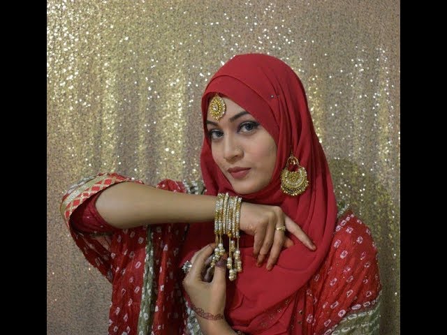 Woman in red hijab and silver hoop earrings photo – Free Clothing Image on  Unsplash