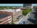 From the soaring heights of our drone, you'll witness the impressive exterior features and the strategic location of this office building. Discover its proximity to major transportation hubs, bustling city life, and a thriving business district. Capture the attention of potential investors and business owners as we showcase the expansive parking area, sleek modern design, and the vibrant energy surrounding 155 Washington Avenue.